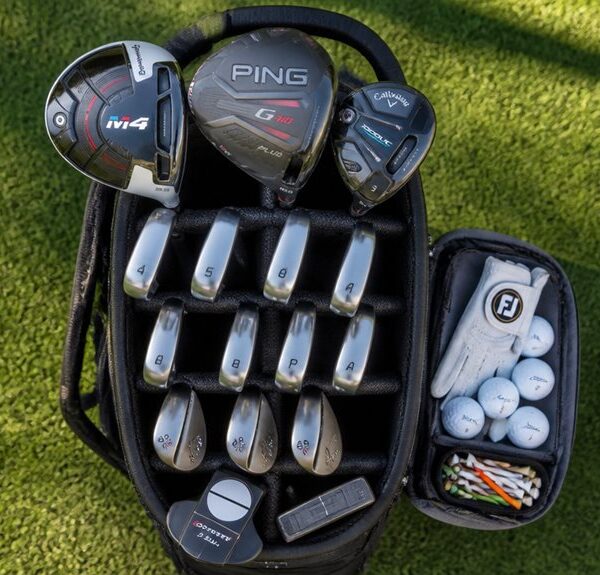 Wie man eine Golftasche packt